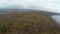 Aerial shot, forest with naked trees in autumn, spring, hunting, fishing season