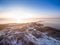 Aerial shot of frozen Kuyalnik Estuary on sunset