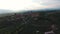 Aerial shot, gorgeous classic small italian village on the hill flyover, in middle of the green nature