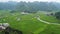 Aerial shot of green farmland and river, karst landform, nature agriculture