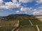 Aerial shot of green hills with vineyards in Novorossiysk city, Russia. Mountain Wizard