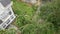 Aerial shot of a group of uprooted trees in a residential area after a tropical storm. Climate change concept