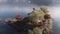 Aerial shot of Hexagonal japanese temple built in 1200`s in Fuji lakes area Japan. Autumn, fall red maple leaves and glisten