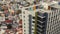 Aerial shot highlighting the stark contrast between a modern condominium and the surrounding lower-income neighborhood in Makati