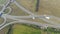 Aerial shot of highway junction, drone follow the truck