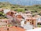Aerial shot of house buildings and mountains of Viguera in La Rioja, Spain