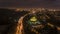 Aerial shot of the illuminated National Science Centre in Kuala Lumpur, Malaysia