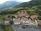 Aerial shot of Leaburu village with the San Pedro Eliza church in Tolosa, Basque, Spain