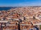 Aerial shot of the Lisbon buildings with tops of red roofs in Alfama, Portugal.