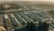 Aerial shot of a major wholesale commercial centre full of trailer trucks loading at warehouse bays