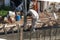 Aerial shot of a man standing on top of shuttering and guiding the cement chute pouring cement into the shuttering