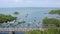 Aerial shot of many fishing boats near the beach