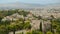 Aerial shot of Mediterranean resort city, tourists viewing cityscape, timelapse