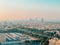 Aerial shot of Middle Eastern city architecture Abu Dhabi city skyline and landmarks Downtown at sunset