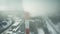 Aerial shot of a modern triple smokestack in winter