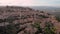 Aerial shot Montalcino. Medieval city on the hill. Brunello wine homeland, Tuscany Italy.