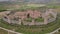 Aerial shot Monteriggioni. Medieval castle on a hill, preserved to this day in Italian Tuscany. Summer