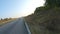 Aerial shot of motorcyclist riding on modern sport motorbike at autumn highway. Biker racing his motorcycle on country