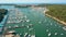 Aerial shot of multiple parked boats, motorboats and sailboats at the Adriatic sea marina