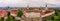 Aerial shot of the old town of Tallinn with orange roofs, churches\' spires and the Toompea castle