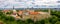 Aerial shot of the old town of Tallinn with orange roofs, churches\' spires and the Toompea castle