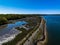 Aerial shot over West Neck Beach on Long Island in the suburb of Lloyd Harbor New York on sunny day