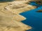 Aerial shot over West Neck Beach on Long Island in the suburb of Lloyd Harbor New York on sunny day