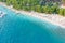 Aerial shot of people enjoying the beach near trees in Makarska, Croatia