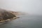 Aerial shot of Point Reyes National Seashore in California during a misty weather
