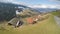 Aerial shot of private household, small farm in Austrian Alps, amazing top view