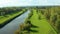 Aerial Shot Of river and trough and trees tinged in autumn colors