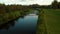 Aerial Shot Of river and trough and trees tinged in autumn colors