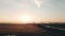 Aerial shot of the rural dutch countryside with fog at sunrise, Netherlands. Cows and water.