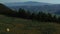 Aerial shot of sagebrush pastureland with mountains