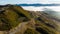 Aerial shot - Scenic view of Road at the peak at Bank Peninsula, Akaroa, New Zealand