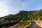 Aerial shot - Scenic view of Road at the peak at Bank Peninsula, Akaroa, New Zealand