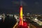 aerial shot of the Smokestacks at Plant Riverside Entertainment District with red lights at sunset