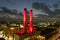 aerial shot of the Smokestacks at Plant Riverside Entertainment District with red lights at sunset