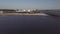 Aerial shot of standup paddleboarding close to the port entrance