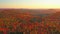 Aerial shot almost still revealing the colorful mountains of Mont-Loup-Garou park while the sun is setting