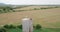 Aerial shot: Stork in the nest on the water tower in the village