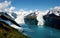 Aerial shot of three majestic glaciers calving into Prince William Sound.