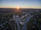 Aerial shot towards a sunset behind Kamianets-Podilskyi castle