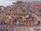 Aerial Shot of the typical Dutch houses in Volendam showing the typical lines of homes and street with harbor. Volendam