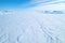 aerial shot of a vast snowy glacier