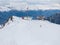 Aerial shot of Verbier, Switzerland shows snow slopes, ski lifts