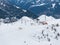 Aerial shot of Verbier, Switzerland shows snow slopes, ski lifts