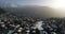 Aerial shot of a village in Switzerland that was covered in snow at a popular destination for skiers