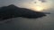 Aerial shot of waves and beautiful sunset on Surin beach in Phuket