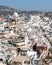 Aerial shot of white buildings of Fira, the main town of Santorini, Greece